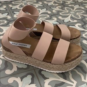 Steve Madden platform sandals.